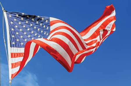 Jumbo Beautiful American Flag On A Flying Against A Sky